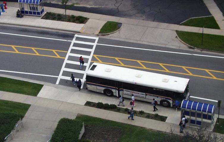 Bus stop location should allow for pedestrians to cross the street safely.