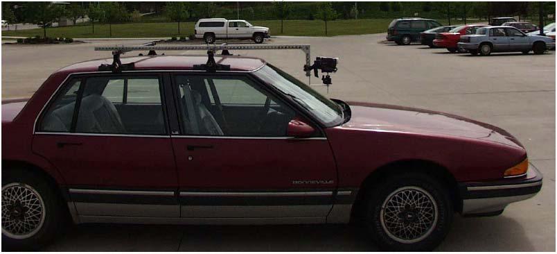 Mounting the video camera to the top of the car involved mounting a bicycle rack to the top of an automobile, and then attaching a boom to the bicycle rack that would be used to mount the camera in