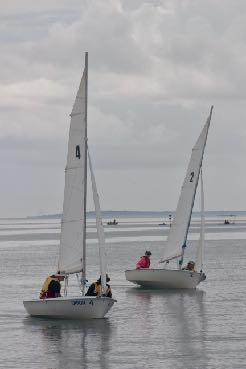 (Top left) Alene Ivey and Guy Hickey sailing Vagabond 4.