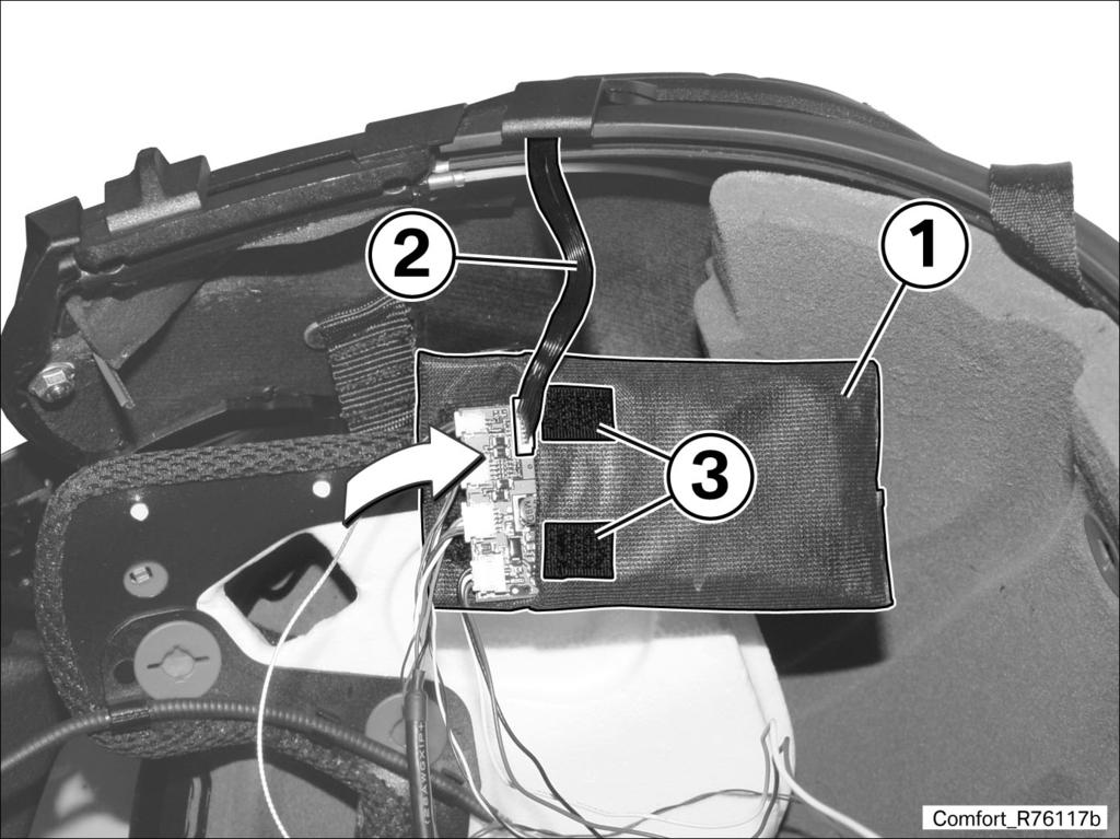 points toward outside of helmet. 15 Install main board Slide wired main board completely into waterproof bag (1).