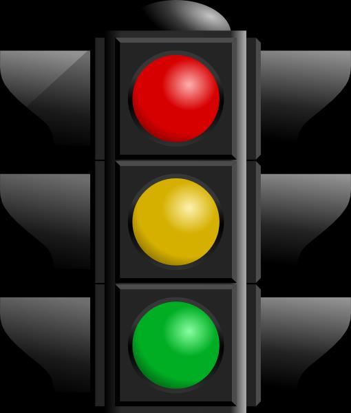 TRAFFIC SIGNAL RED LIGHT- YOU MUST STOP. CHECK YOUR REAR ZONE AS YOU BEGIN TO SLOW.