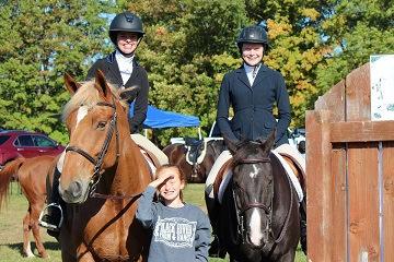 Riders enjoy the relaxed atmosphere, the variety of classes (flat, singles, pairs, follow the hounds, hunt teams, and lead line), and the opportunity to compete for ribbons and many lovely trophies.