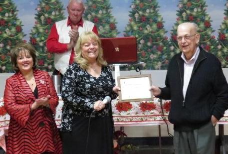2017 Hall of Fame Award Honoree DCHDC President Linda Trader presents the 2017 Hall of Fame Award to long-time member and past president Andy Anderson at the December 9th holiday party.