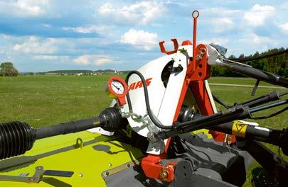This suspension system transfers the weight of the mower from the grass cover to the tractor.