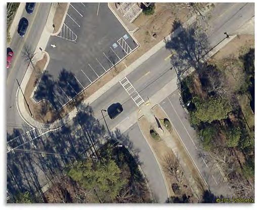 intersection at Mt. Vernon Road and the All Saints Catholic Church driveway is located in the northeast quadrant of Dunwoody (#6: See Figure 2). There are existing sidewalks on both sides of Mt.
