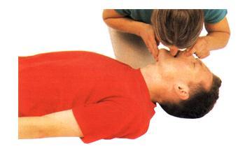Once the airway is unblocked, place your hand on victim's forehead and your other hand under the tip of the chin and gently tilt his head backward.
