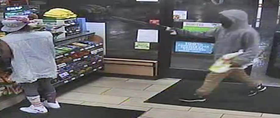 7-11 store video The suspect, wearing a mask,