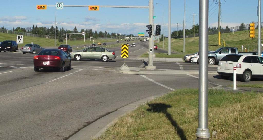 Figure 2: Small Radius Right Turn Island, with Added Lane Figure 3 shows this situation at the intersection of Heritage Drive and Glendeer Circle in Calgary.