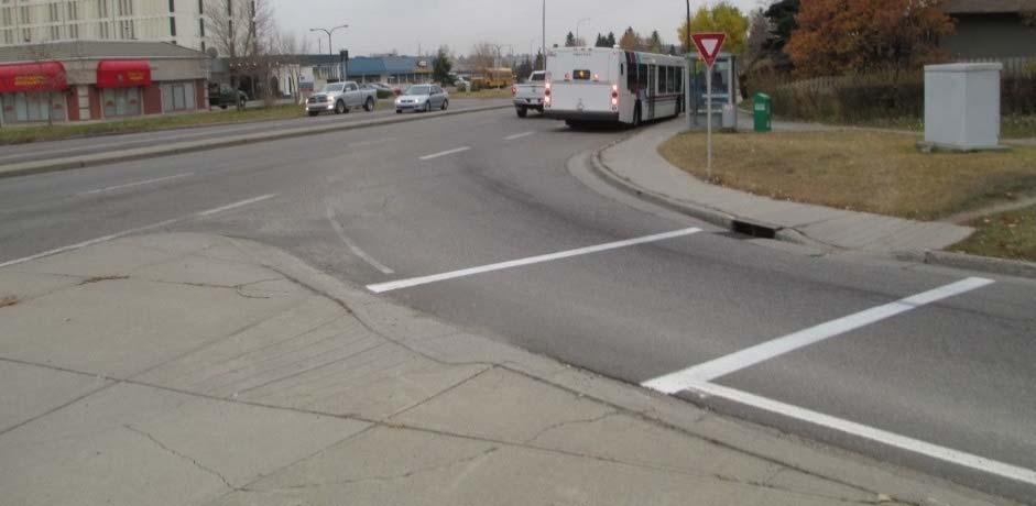 Figure 4: Bus Bay at End of Right Turn Channelization with Yield Control Mitigation Measures for Right Turn Channelization Design Consistency Issues For situations where there is an incompatibility