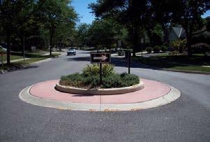 Materials such as brick, cobbles, stamped concrete and concrete pavers may be used along the entire roadway, in limited sections, or along the pavement edges to signal to drivers that they are in a
