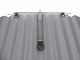 The cylindrical support post must rest in the pan of the roof sheeting. Both locking cam levers must also be located within the roof sheeting pans.