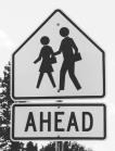 Traffic Signs Posted Near High Schools Near Elementary Schools Marks exact location of crosswalk