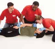 Responders and : kneel beside patient and place backboard between patient and themselves. Responder : grasp patient s far shoulder and hip to control patient.