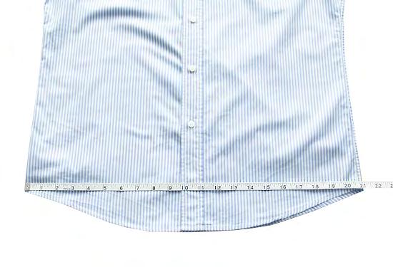 HALF HIPS With the shirt laid flat, measure from left