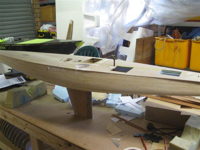 composite left over from a previous boat for the cheeks with wrc spacer blocks, or use 0.8 mm ply deck material. I opted for the ply.