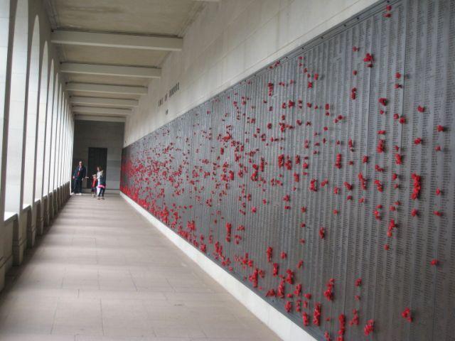The bronze walls of the War Memorial list the names of the fallen in
