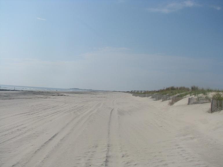 Over the winter and spring of 2012 some sand moved back onshore under favorable weather conditions. The shoreline position advanced 25 feet but the net profile volume lost 20.57 yds 3 /ft.