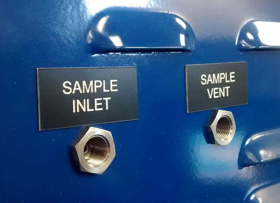 Gas Inlet Port for Auxiliary Calibration Calibration with a Sample Line makes use of the Sample Inlet Port located on the side of the enclosure opposite the ports used for Automatic Calibration and