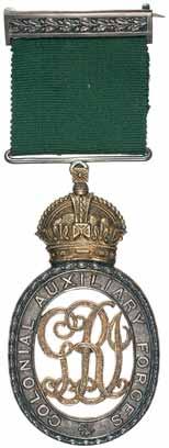 4570* Colonial Auxiliary Forces Officer's Decoration, (GRI), with brooch bar suspender.