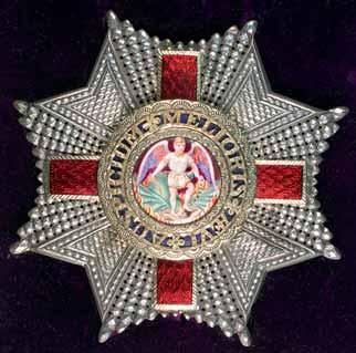enamel breast star and sash badge with full sash. A few enamel chips, otherwise extremely fine and scarce set of three.
