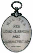 $100 4865 Singles: Volunteer Officer's Decoration (Victoria VR type). Unnamed but hallmarked.; Efficiency Medal (GVIR Indiae. Imp) with Territorial suspender. 2035520 Gnr. H.J.Johnson. R.