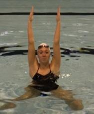 TEST 9: THREE-LAP SYNCHRO ROUTINE (continued) LAP 2 - Push off the wall to assume a Back Layout Position with the arms overhead, Reverse Torpedo (Dolphin) scull to 12.50 yard mark.