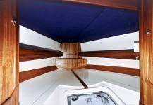 The forepeak is equipped with a spacious double bunk (2 m long), three lockers and swallows nests for