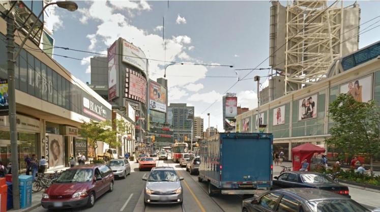 camera. Bay Street Field observations have shown that curbside activities along Dundas Street are a significant contributor to delays to traffic passing through the Yonge and Dundas intersection.