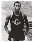 He received a scholarship to run track at Grambling under Coach Tom Williams during 1966-1969, and earned NAIA All-American and All-SWAC honors in the 60, 100 and 220