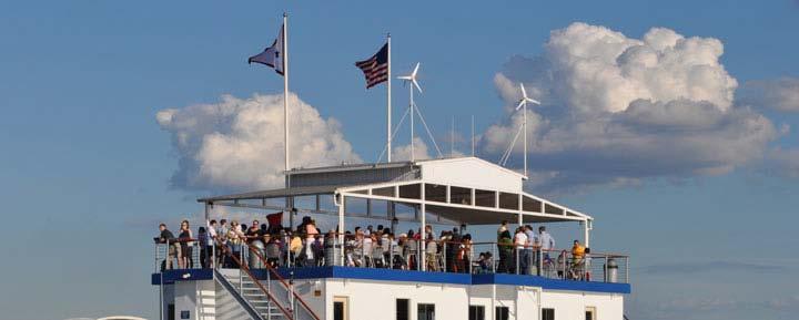 The floating clubhouse makes the Corporate Sailing League inclusive to everyone within your company. You can invite employees, clients and guests to watch the races from the clubhouse.