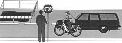Q6. A car and a bicycle are travelling along a straight road. They have stopped at road works.