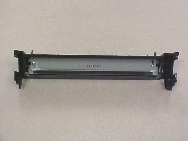HP 1320 Toner Cartridge 12. To remove the wiper blade, remove the two screws as indicated in Fig. 9.