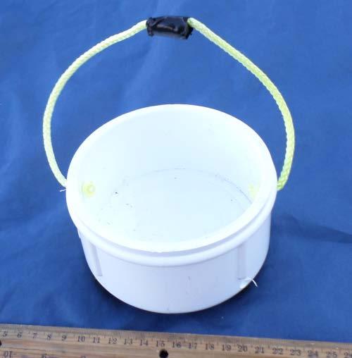 SCOUT product demonstration build photo #14: Sediment sample. Cap: The cap is constructed from the lid of a Sterilite 6 Qt. (5.7 L) plastic storage box with a non-latching lid.