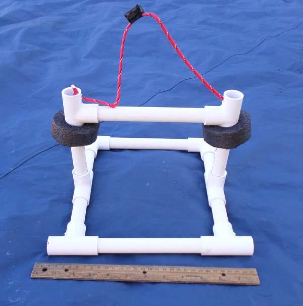 Frame The frame is constructed from ½-inch PVC pipe and fittings. A rope with flotation attached will act as a grab point for the frame, but ROVs can also use the PVC pipe to carry the frame.