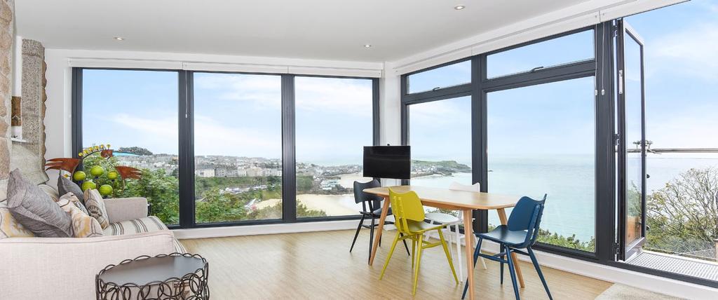 Scots Craig Trelyon Avenue St Ives Cornwall TR26 2AD Incredible panoramic views of iconic St Ives Fabulous conversion with amazing blend of old and new Spacious sitting room with broad balcony