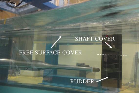 The drag of the rudder shaft can be eliminated by the shaft cover which have same wing section to the rudder.