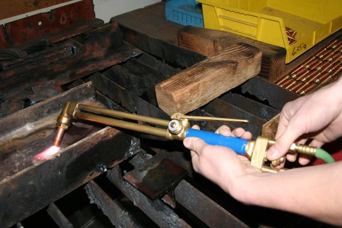 Step 8: Before making any adjustments, place the tip directly to the steel, holding it at a 45* angle