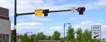 Does not cross any auxiliary lanes (left or right-turn lanes or their transitions) where it is anticipated that vehicles will be changing lanes and may be distracted from observing pedestrians in the