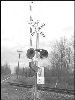 Dead tracks are tracks that are no longer in use. The rails may be pulled up on both sides of the crossing.