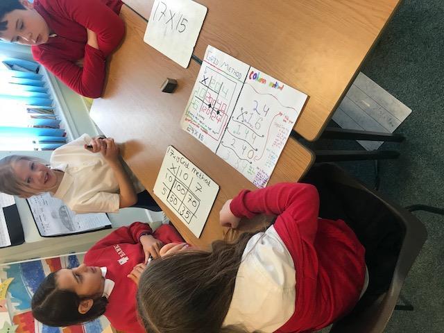 com.thank you. Maths P6C were delighted to host P5A this morning to teach them how to multiply 2 and 3 digit numbers by a 2 digit number.