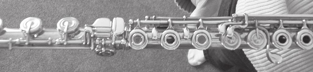 On an open-hole flute, plugging the right hand, first finger and third finger keys may be helpful if the natural span between the fingers causes these key holes to vent (Fig.11).