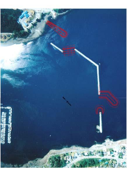 A 315-foot-long extension would connect the main breakwater and the south breakwater to reduce wave energy focused through this area from the Gulf of Alaska; The north end of the main breakwater