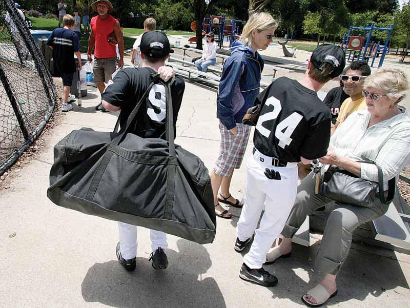 Members of the Palo Alto Giants bring equipment for the Sunday, May 7 game.