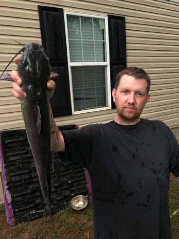 a catfish (L), and Jason reeled in a big gar (R) - keep your fingers out of that mouth!