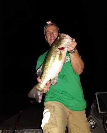 93) OPEN 7 DAYS - Big Game Checking Station 423-334-9518 John Henry with a nice largemouth on Watts Bar 7/27/18. Photo Jerry s Bait Shop.