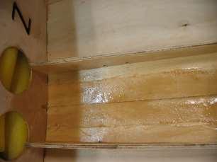 Using a brush, coat all areas of wood inside the hull. Get inside the holes and Z s. Be careful not to get any resin in the bolt holes for the skeg.