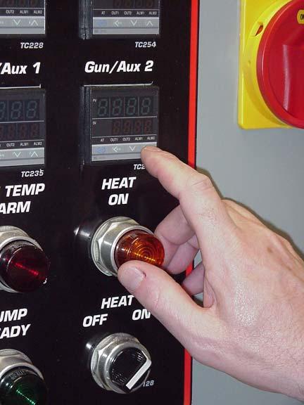 System Heat Up 5. Adjust the set points on the individual controllers to the desired temperatures by pressing the UP or DOWN arrow keys on the temperature controllers (Fig. 19).