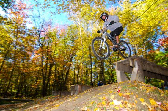 this leads into a fast and fun downhill section with rollers, berms, and bridges, which brings riders back through the Highland Mountain base area to the start/finish line.