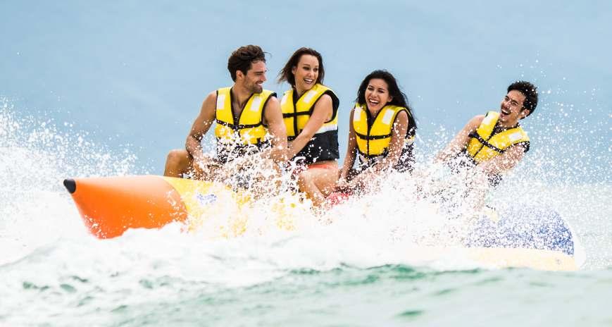BANANA BOAT RIDE Wet and wild banana boat rides are many people's favorite water sport. The banana is an inflated tube that is towed by a jet ski.