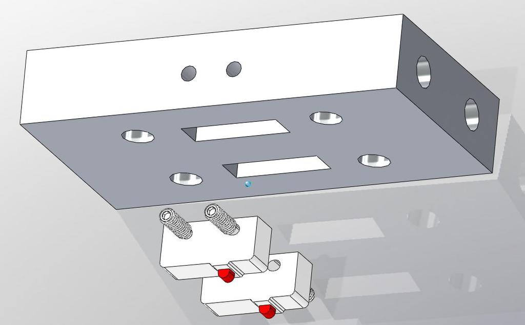 Figure 23: Attachment Plate Modifications Set screw holes Slots for sensors We will also be widening the
